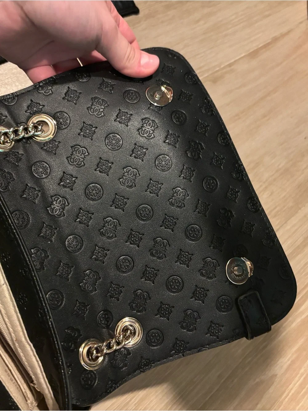 Guess Black Embossed Logo Shoulder Bag with Gold Hardware